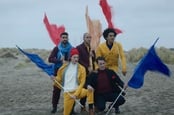 Breunion Boys pull shapes on a beach