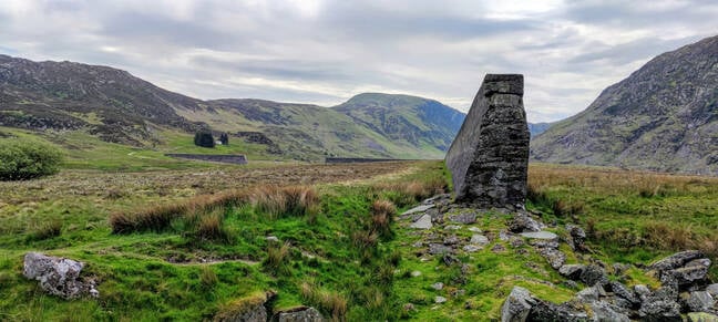 From the breach looking up into Cwm Eigiau. The large gap in the short leg of the dam was to be a revised spillway if the dam was ever put back into use.